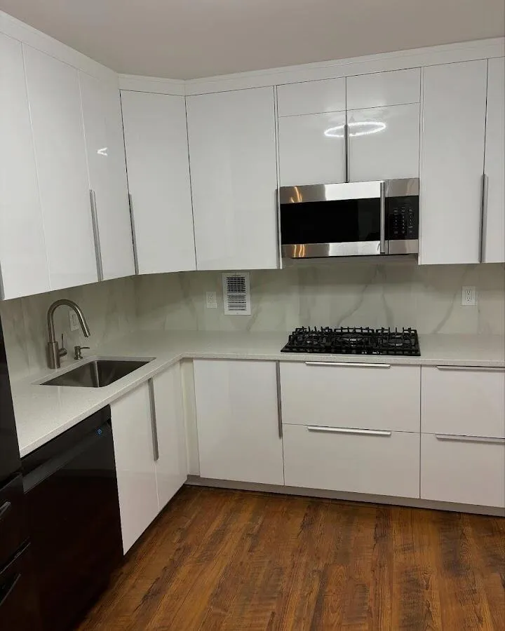 Restored kitchen with white cabinets after water damage in Richmond